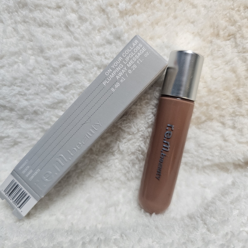 r.e.m. beauty On Your Collar Plumping Lip Gloss in the shade "Away Message"